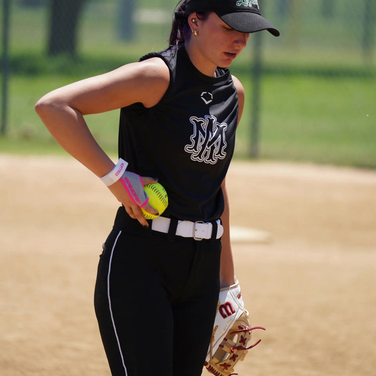 Pitcher wearing SpinGrip Softball glove